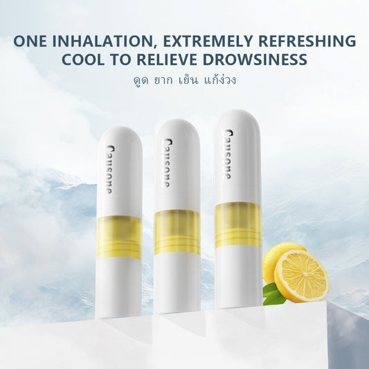 Three portable nasal inhaler sticks presented with fresh lemon decoration