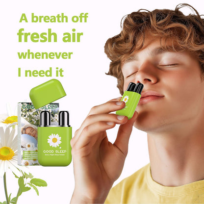 Person inhales from compact dual nozzle nasal stick for calming fresh aroma
