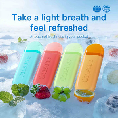 Four differently flavored pocket breath freshener sticks arranged with fresh fruits and ice