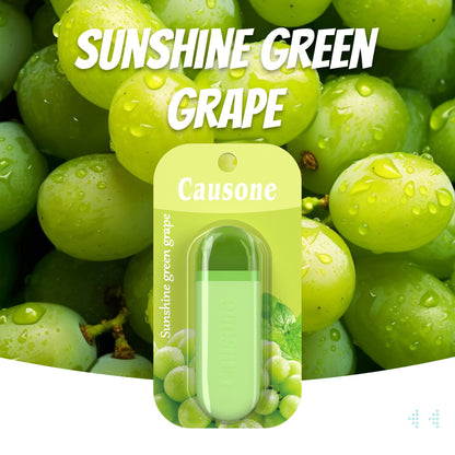 Green grape scented breath freshener stick packaged on plump fresh green grapes