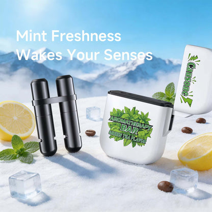 Open dual nasal inhaler stick with green tea aroma placed on snow with lemon and mint