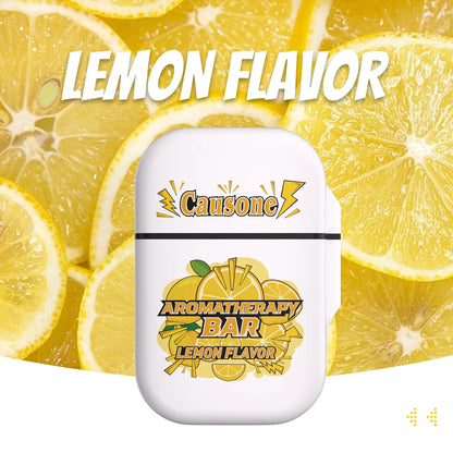 Lemon scented portable nasal aromatherapy inhaler case surrounded by fresh lemon slices