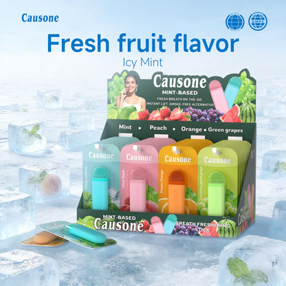 Full set fruit mint breath freshener sticks arranged in retail display box on ice backdrop
