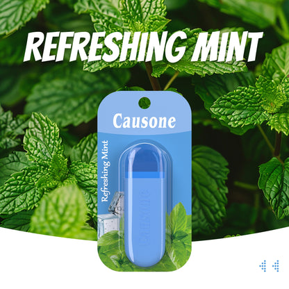 Refreshing peppermint nasal inhaler with blister packaging set against natural mint leaves