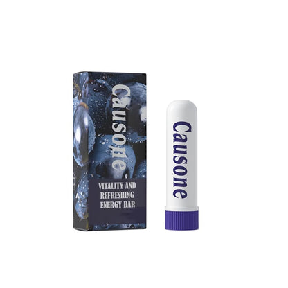 Grape scented portable energy inhaler tube and fruit printed packaging box displayed side by side