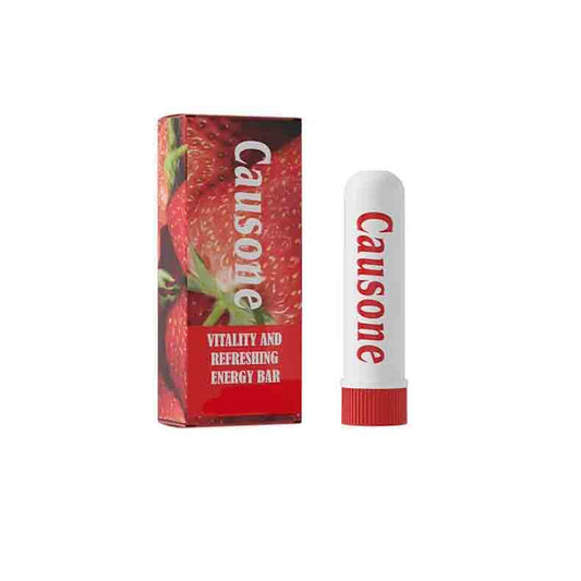 Strawberry scented portable inhaler and fruit pattern outer package isolated on plain background