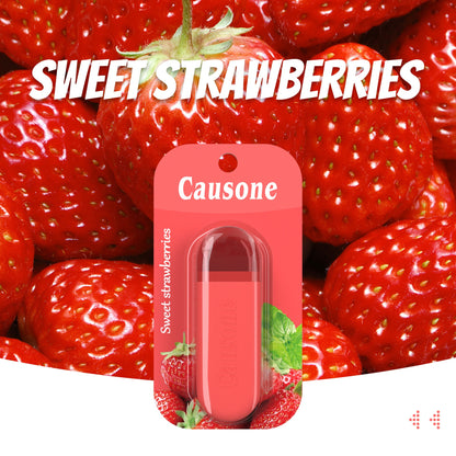 Sweet strawberry portable breath freshening stick displayed among ripe red strawberries